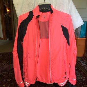 Brooks women’s light  jacket M but runs S.Salmon